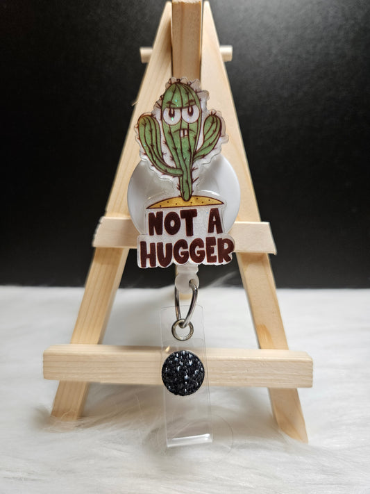 Not A Hugger Badge Reel